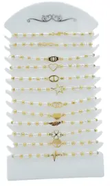 Bracelet élastique perles blanches et motifs assortis x12