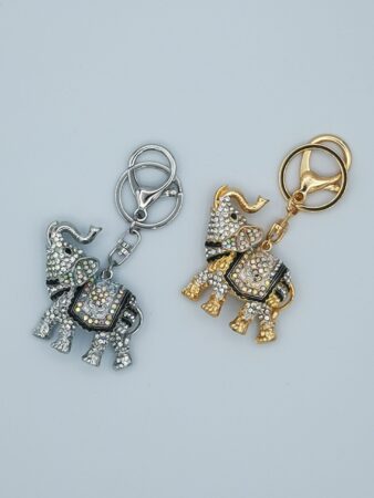 Porte-clés éléphant trompe relevée en métal gold & strass