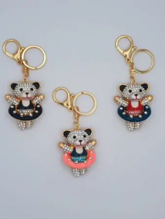 Porte-clés ourson avec bouée en métal gold & strass assortis