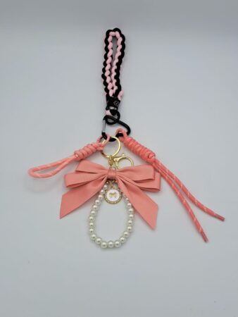 Porte-clés charms accessoire pour sac gros nœud rose et perles