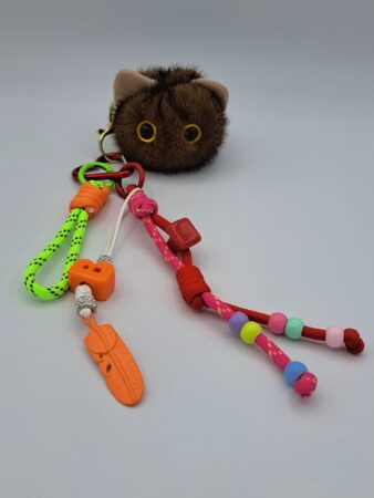 Porte-clés charms accessoire pour sac tête de chat. Couleurs assorties